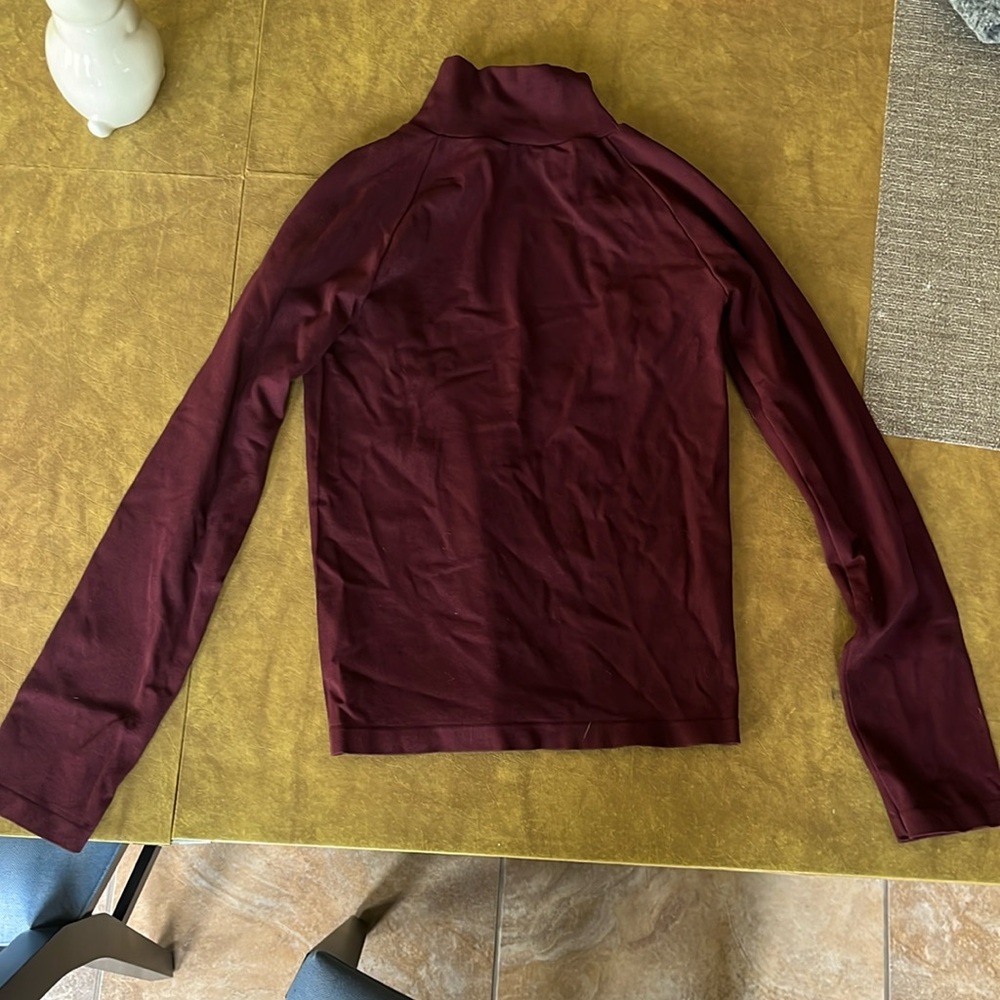 FREE PEOPLE maroon fitted turtleneck with open back size M/L